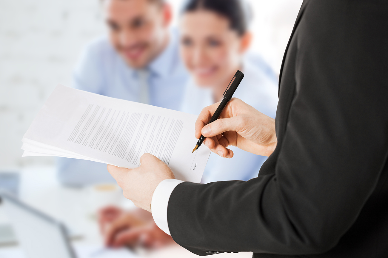 Lawyer with clients.