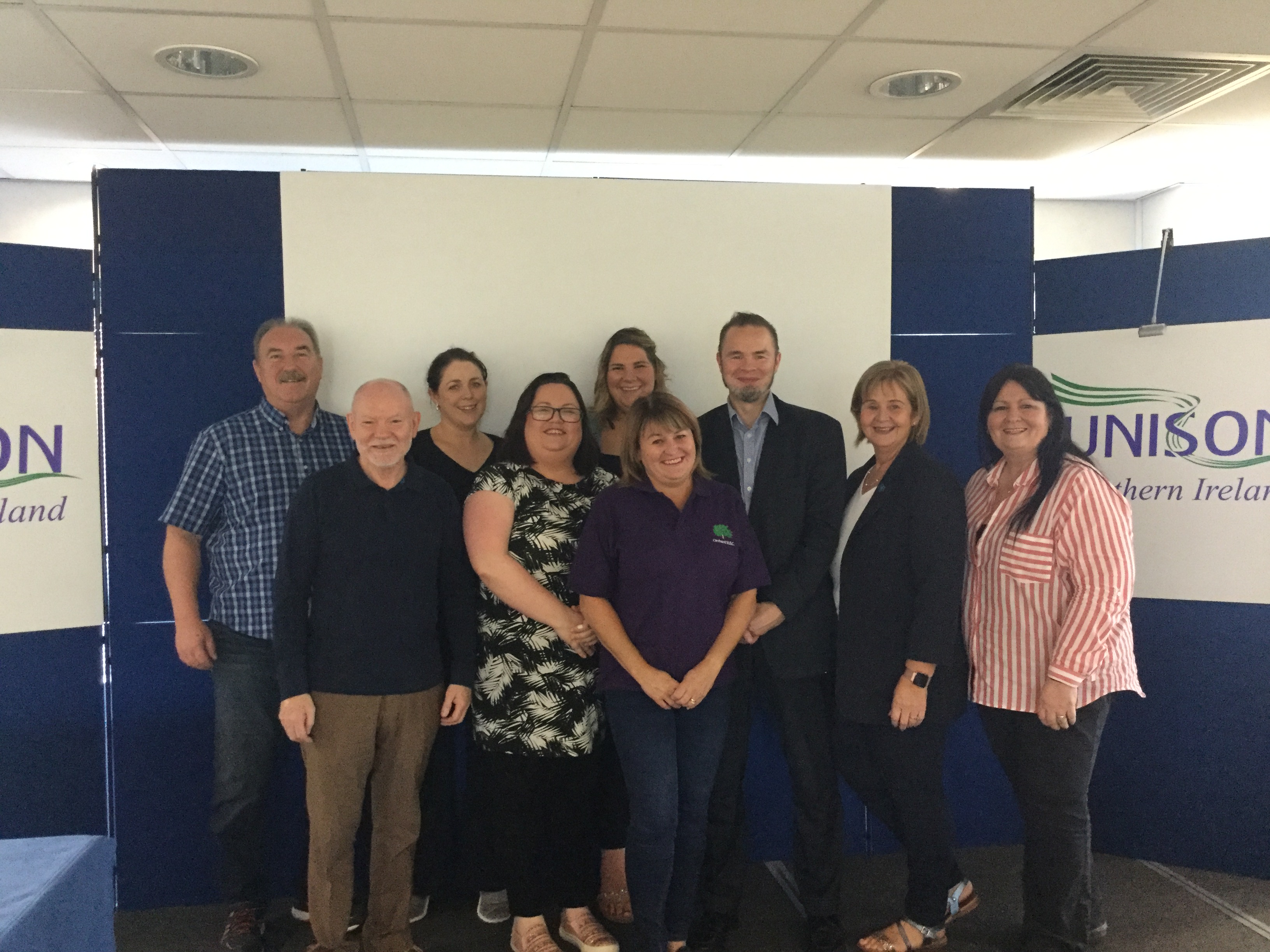 a group of people at a unison conference