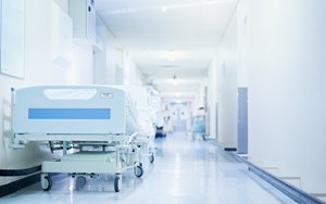 a hospital bed in a hospital corridor