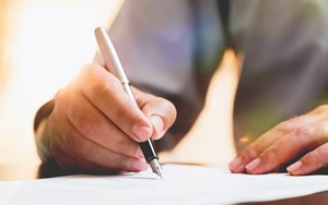 a person signs a legal document